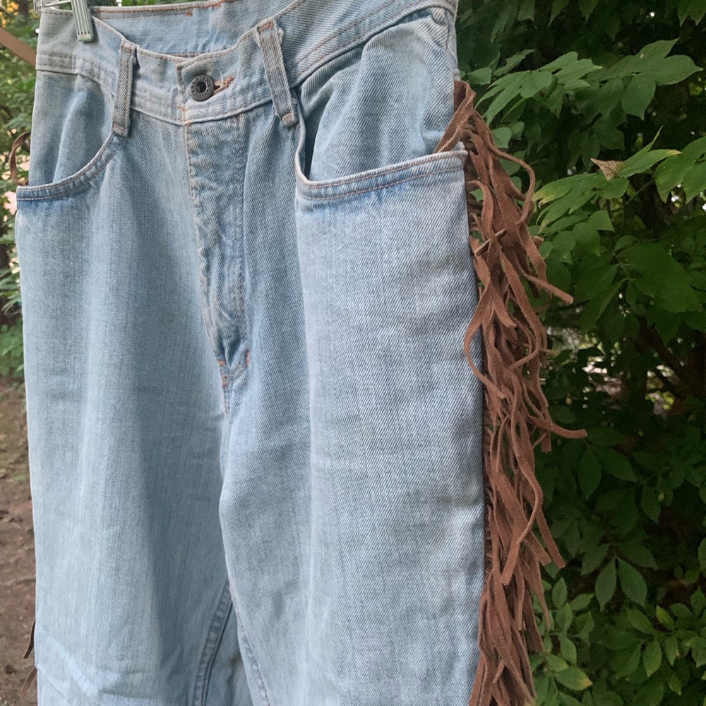 Vintage high waisted jeans with leather fringe